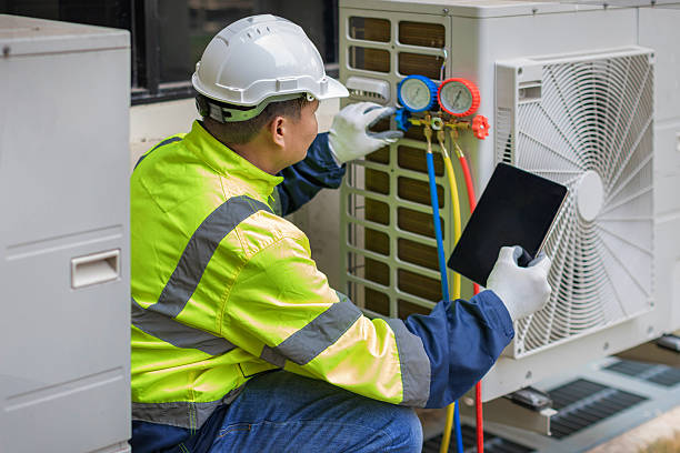 Professional Hvac technician working in Laurinburg, NC
